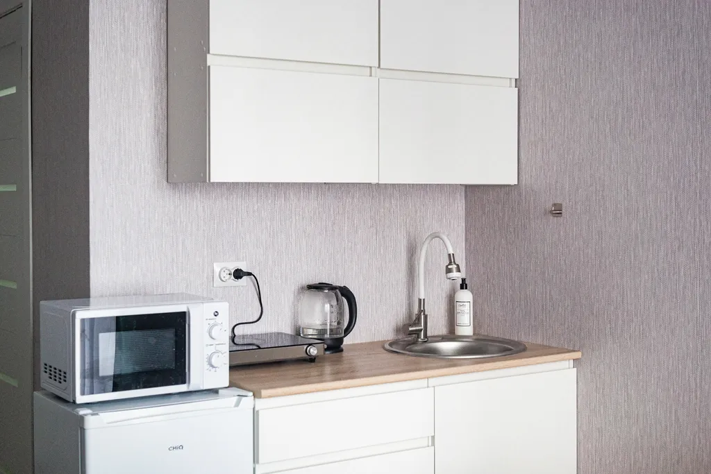 Изумрудная студия с гамаком в новом доме в экологически чистом районе