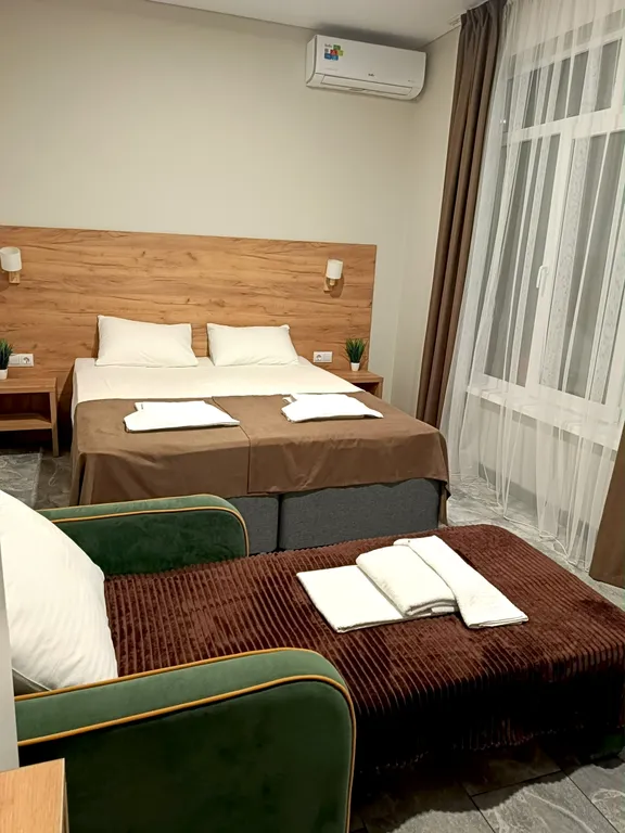 Трехместный номер с выходом во двор