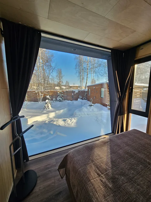 Уютный дом с панорамными окнами