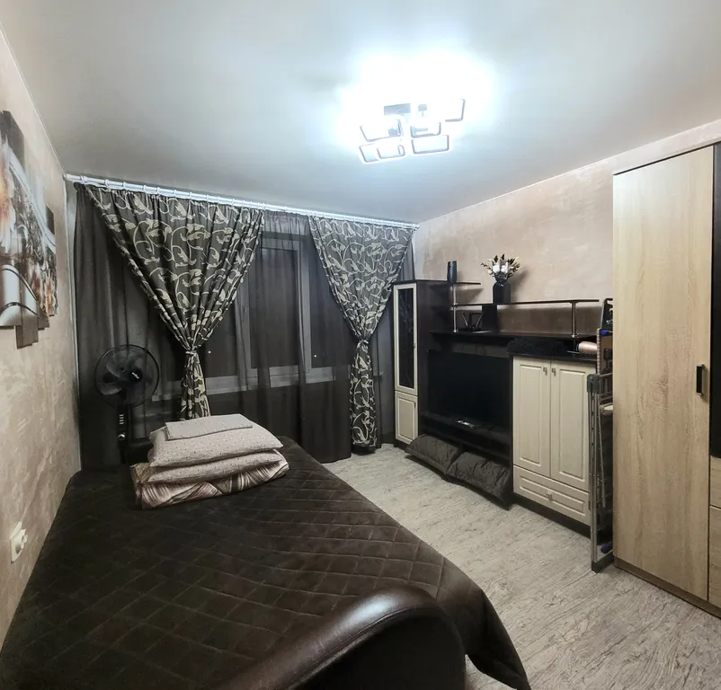 Бюджетная уютная комната-студия в центре с панорамным видом