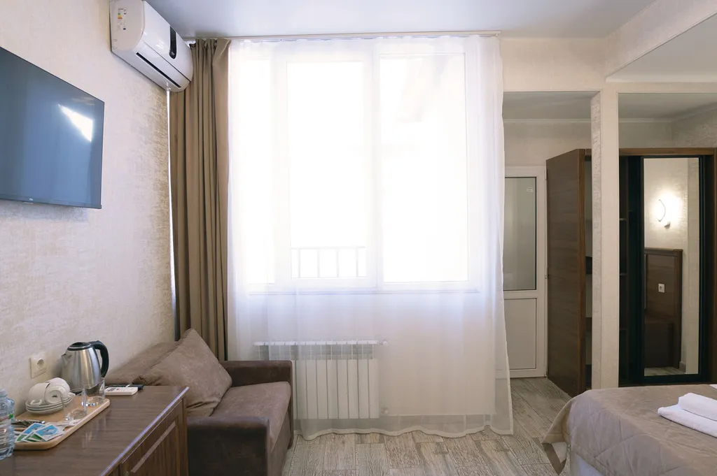 Трёхместный номер вид на горы, доступен бассейн