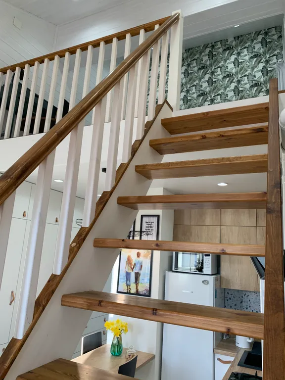 Двухуровневые апартаменты Снегурочка на набережной в центре города