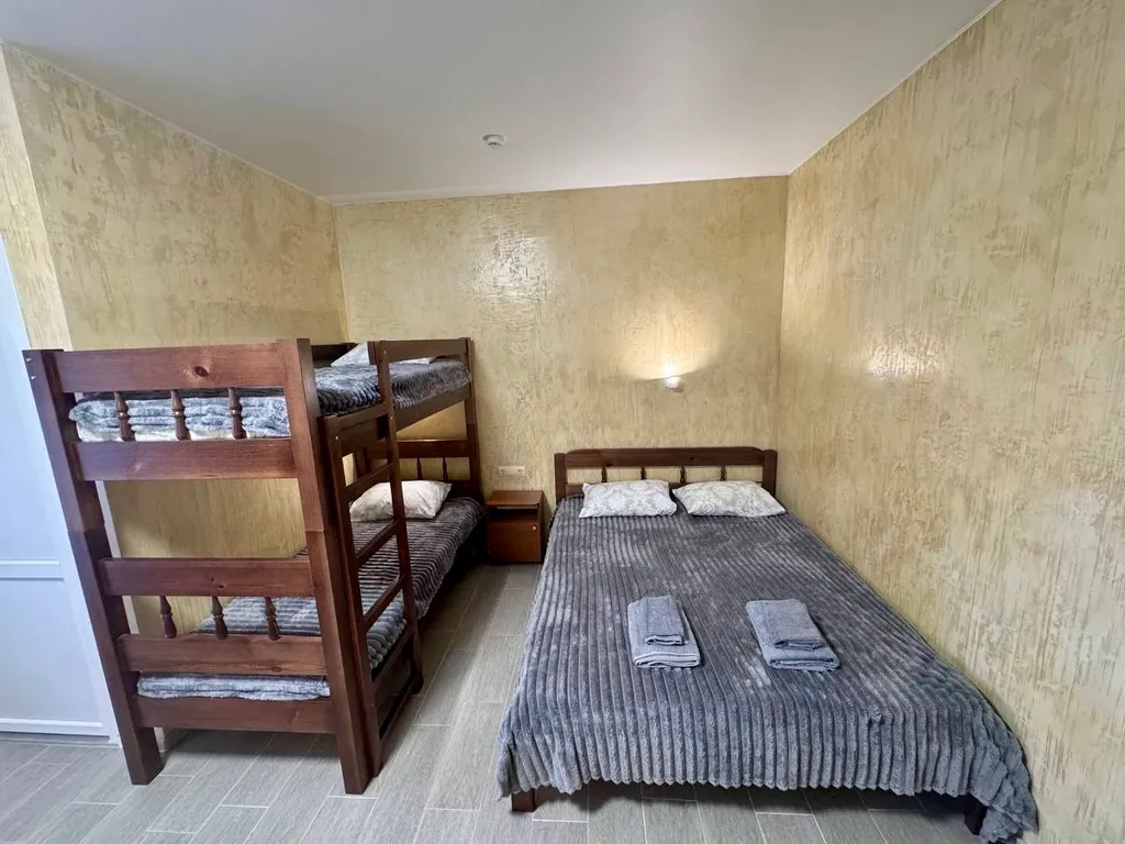 Семейный номер с кухней на веранде в центре