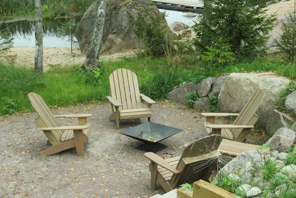 Коттедж Вилла Kaksi с видом на озеро и каменной зоной барбекю — Приозерск