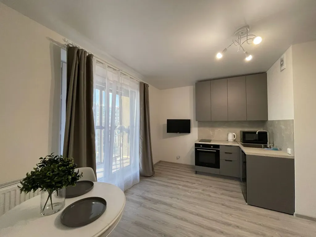 Уютная студия на высоком этаже