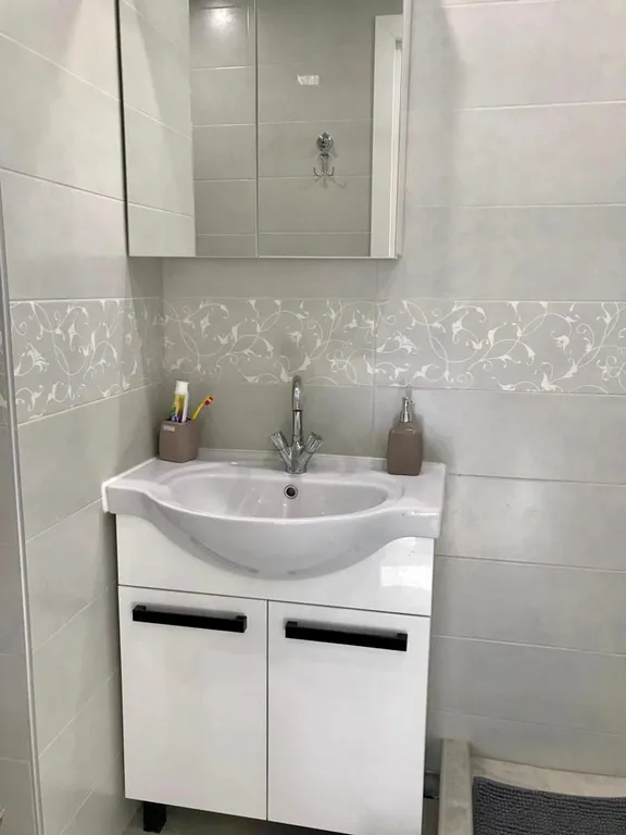 Квартира с зелёной гостиной