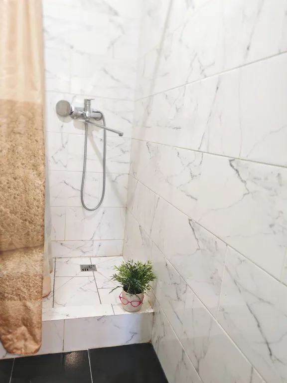 Дом в городе с зоной барбекю