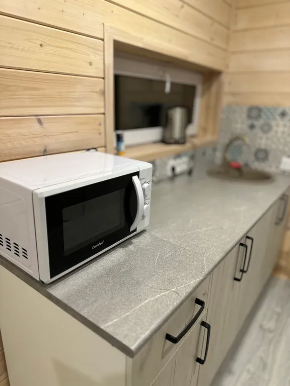 Уютный домик в древних липах