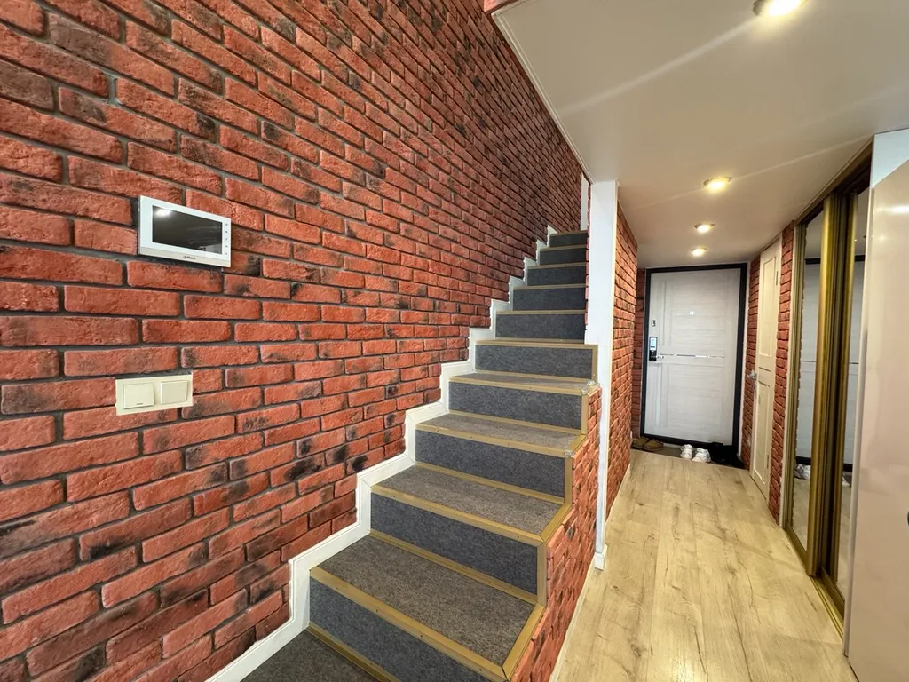 Двухуровневая стильная и комфортабельная квартира