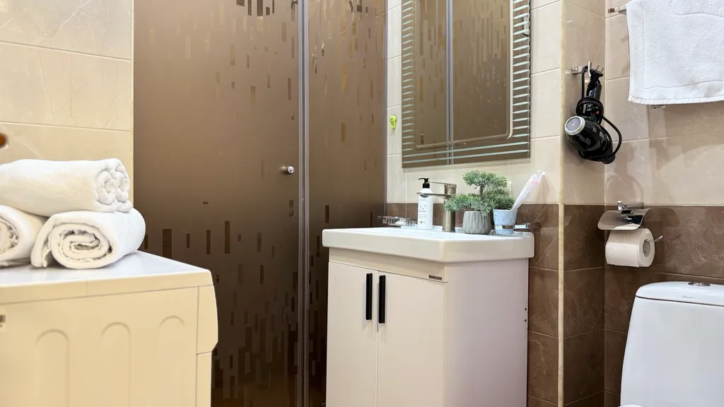 Улучшенные апартаменты с 1 спальней и  балконом в центре города