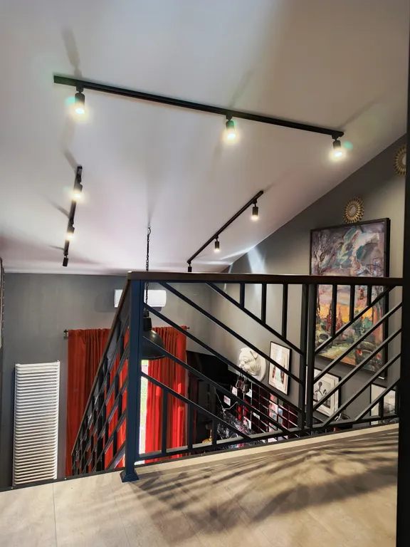 Атмосферная двухуровневая квартира с видом на Петропавловский парк