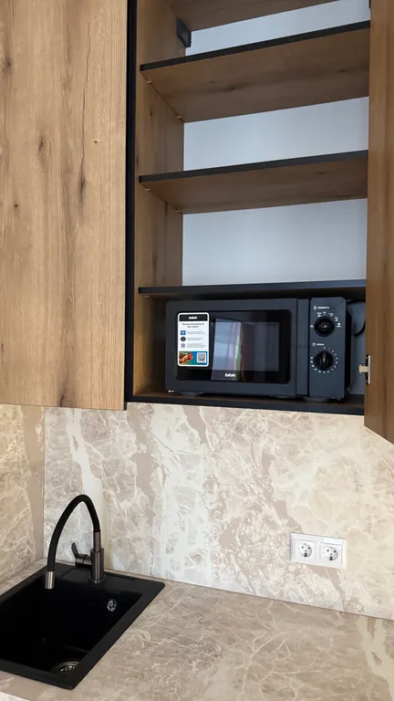 Уютная квартира в центре курортного поселка Домбай