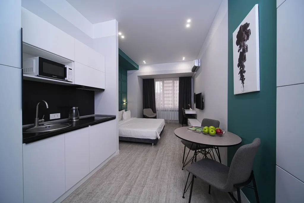 Студия с раздельными кроватями или с одной большой кроватью