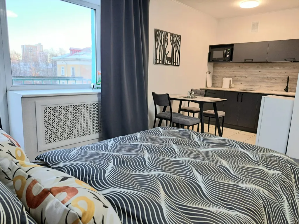 Уютная студия в центре с балконом