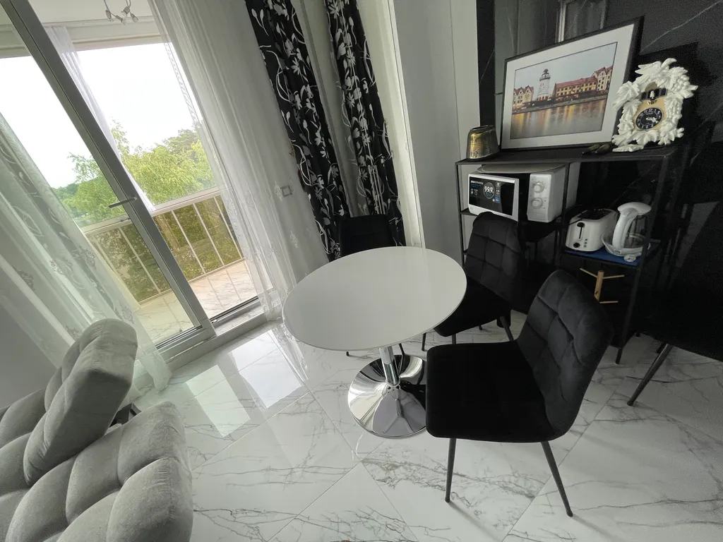 Уютная квартира с видом на озеро и сосновый лес