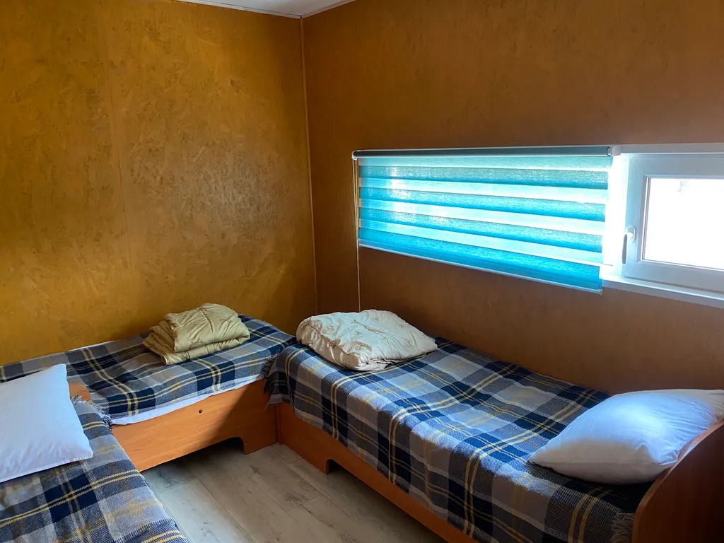 Дом с террасой на берегу реки Кобонка