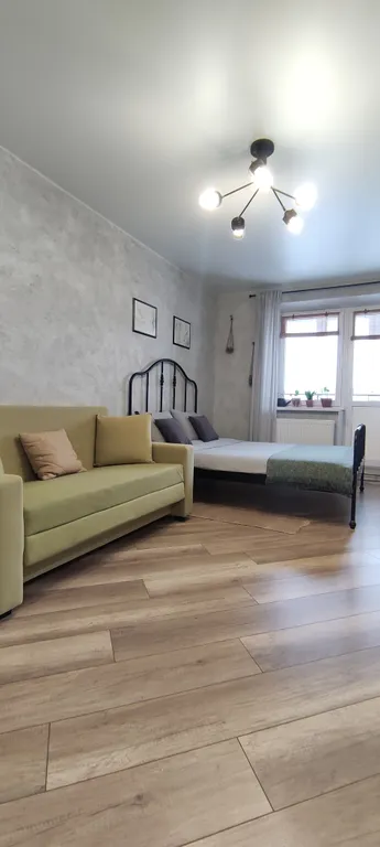 Уютная студия с видом на город