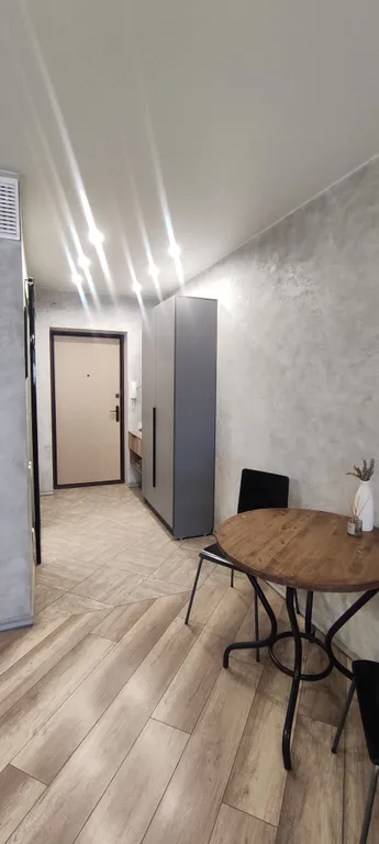 Уютная студия с видом на город