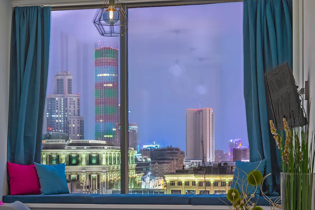 Дизайнерские апартаменты лофт в центре с видом на город