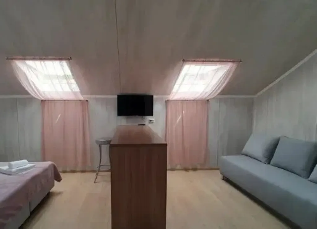 Трехместный номер на мансардном этаже