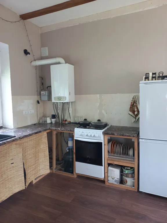 Частный дом в деревне в 15 километрах от центра города