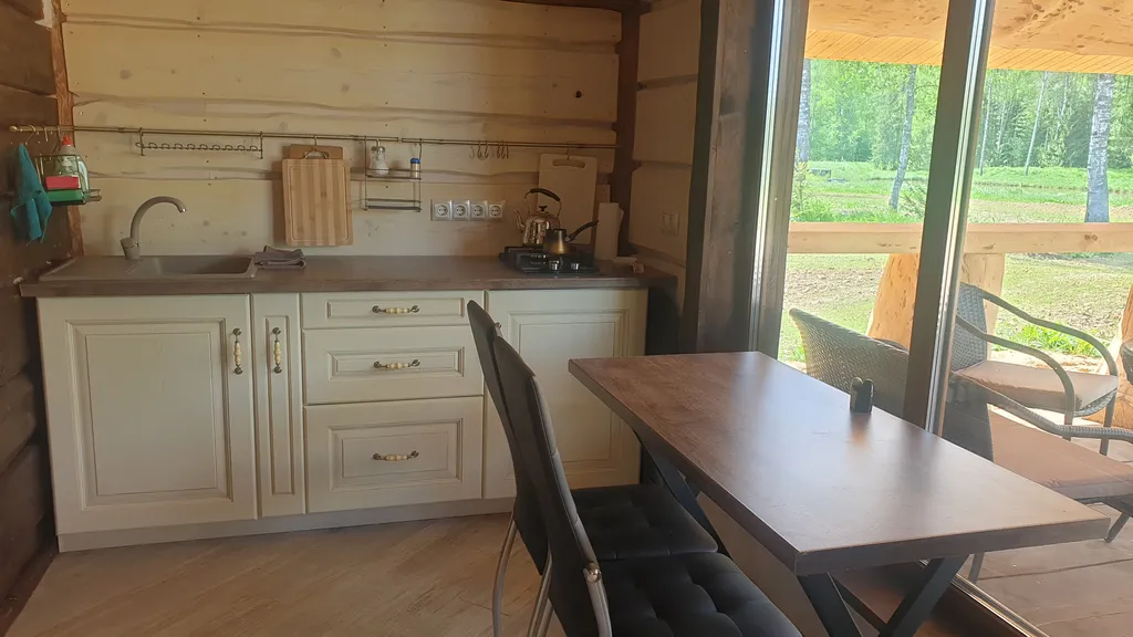 Дом с панорамными окнами с купелью