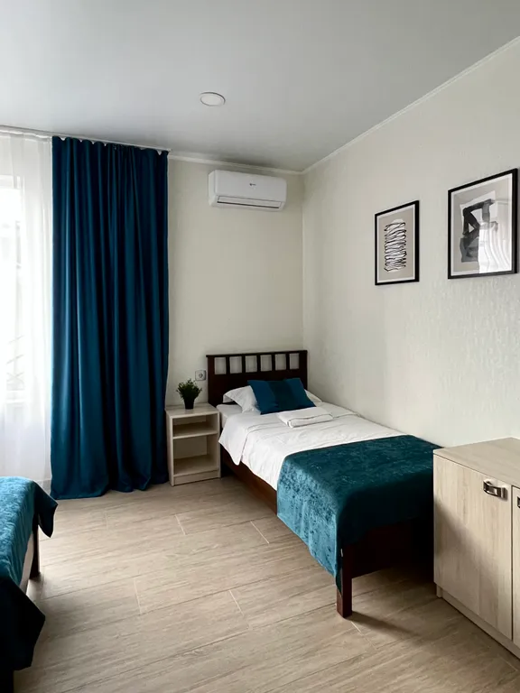 Квартира Квартира Уютный номер с 1 двуспальной или 2 раздельными кроватями — Сириус