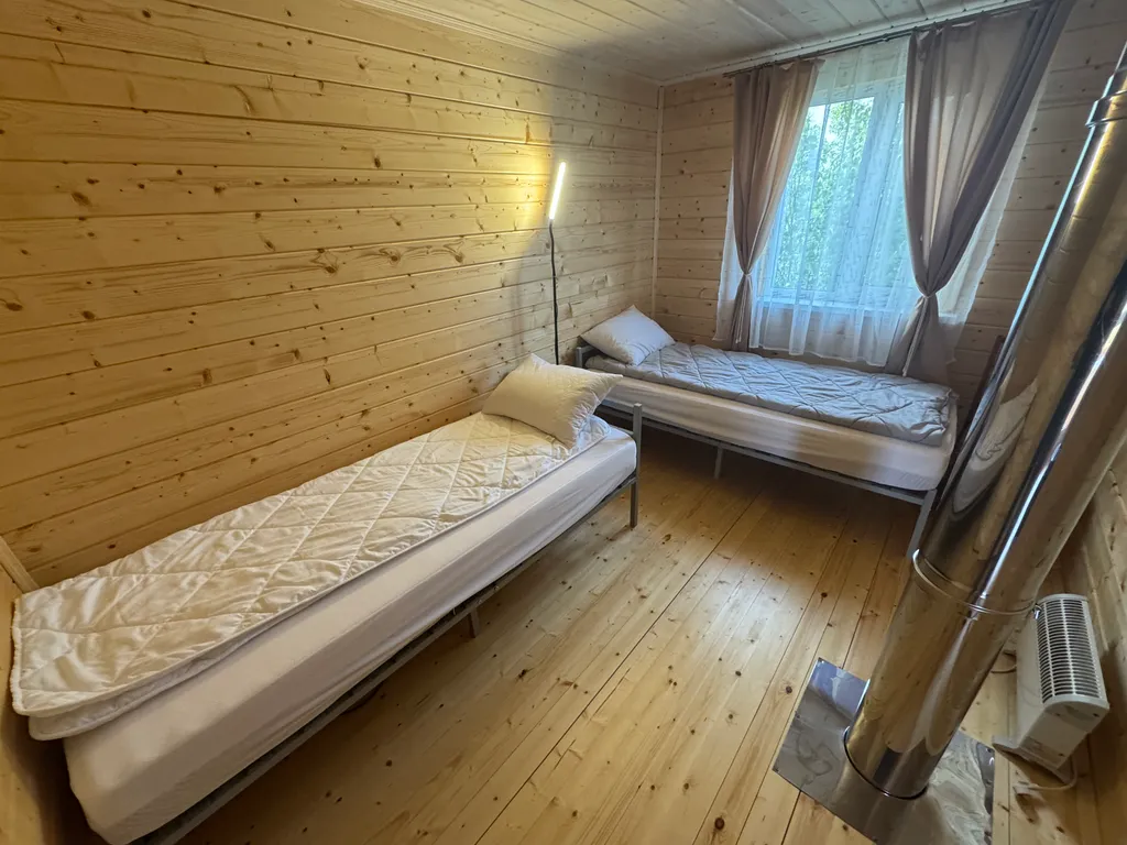 Уютный двухэтажный дом в окружении природы