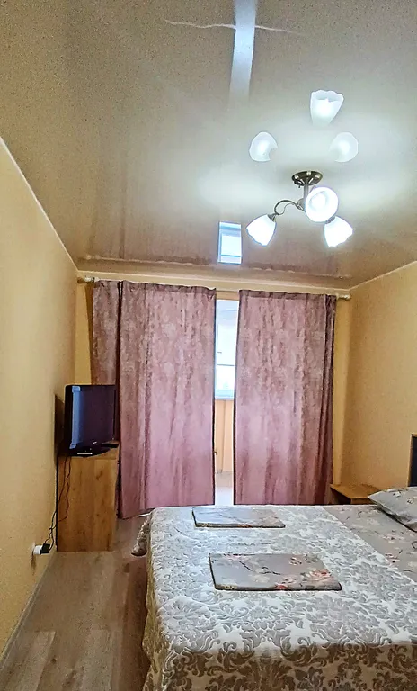 Квартира с видом на набережную и горы