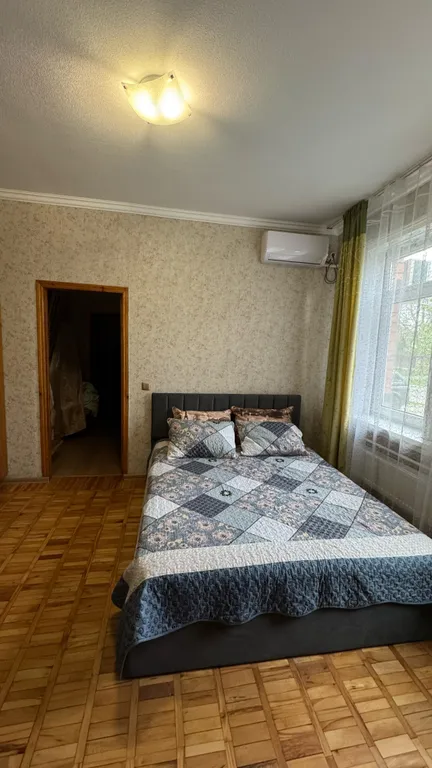 Дом-квартира с мансардой в центре