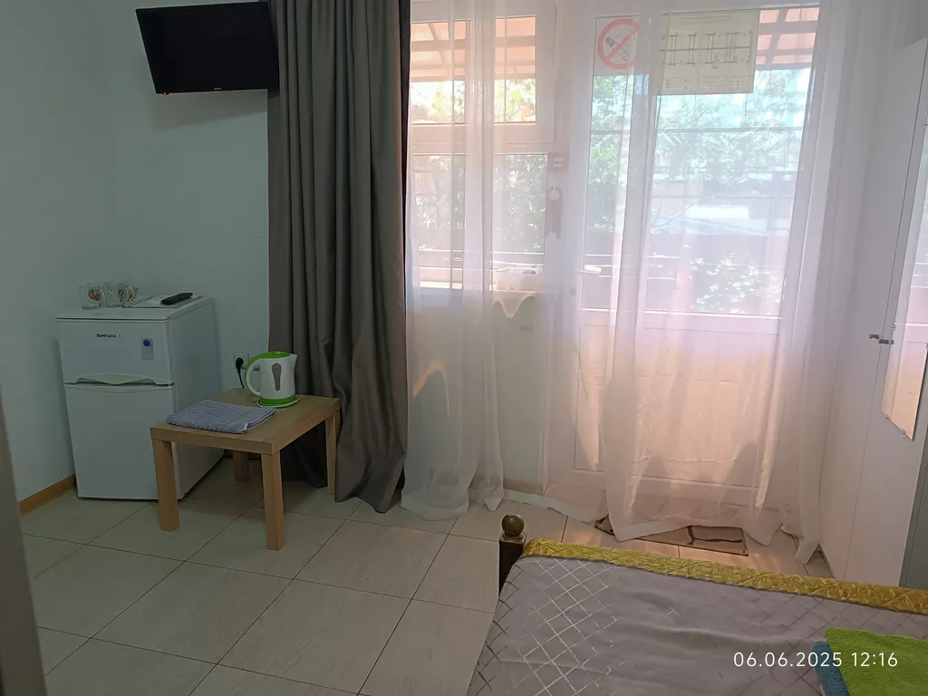 Номер с общей кухней и общим двором