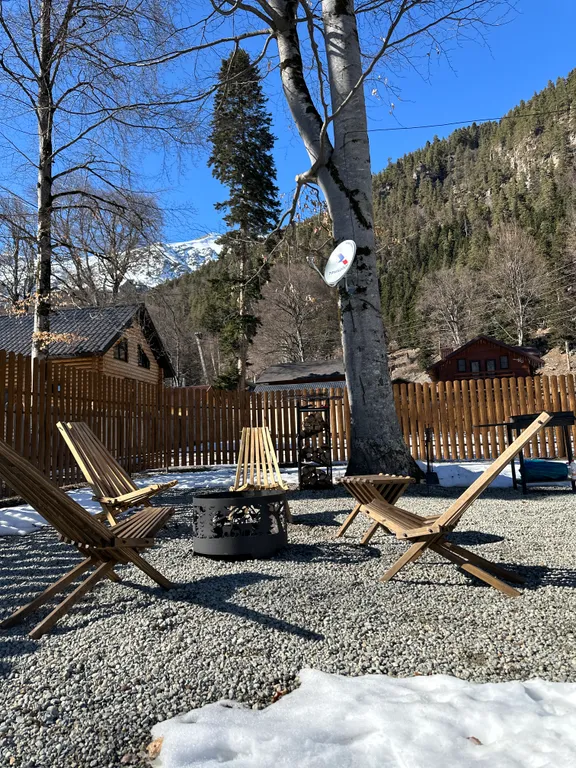 Коттедж Коттедж Уютный барнхаус с большими панорамными окнами — Архыз