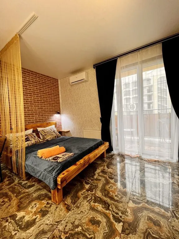 Студия с дизайнерским ремонтом