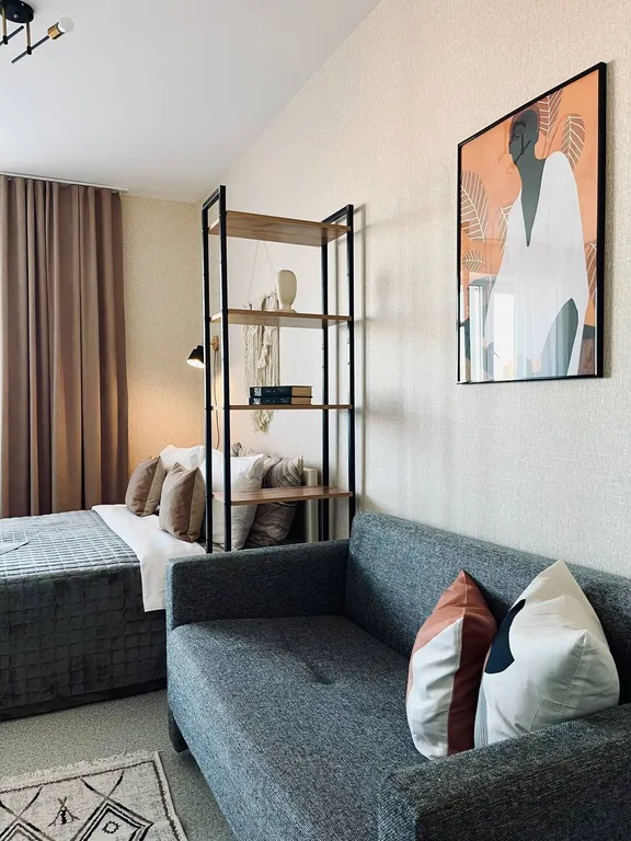 Уютная студия с видом на город