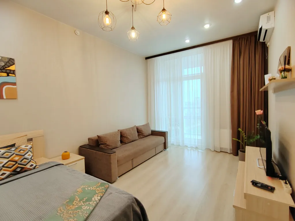 Панорамная квартира на верхнем этаже с видом на город