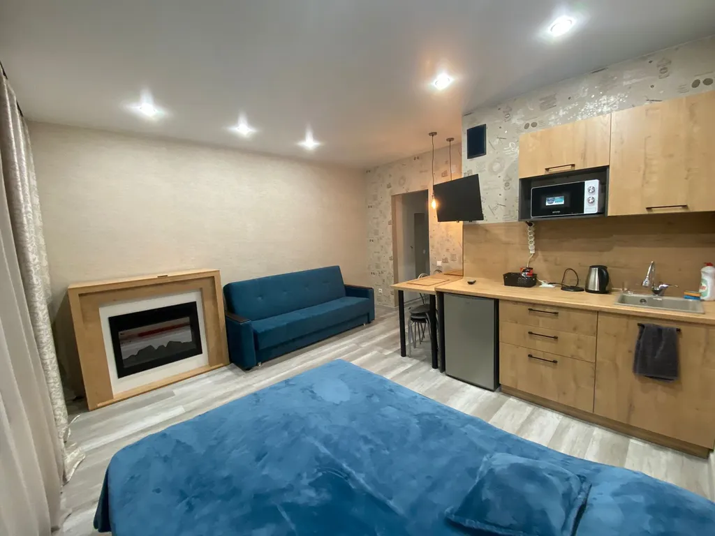 Уютная дизайнерская студия в центре