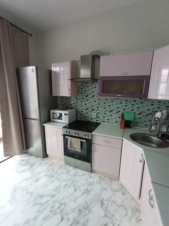 Уютная квартира в тихом районе — аренда посуточно в Петергоф