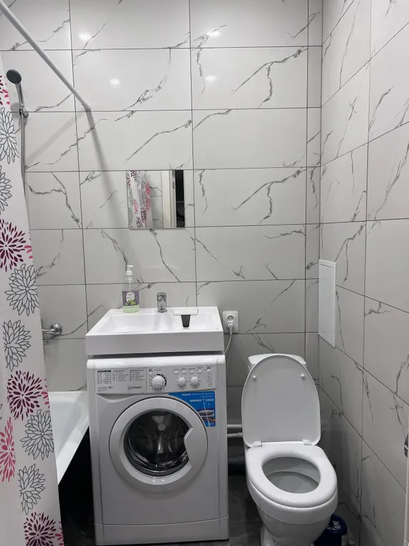 Уютная студия на высоком этаже