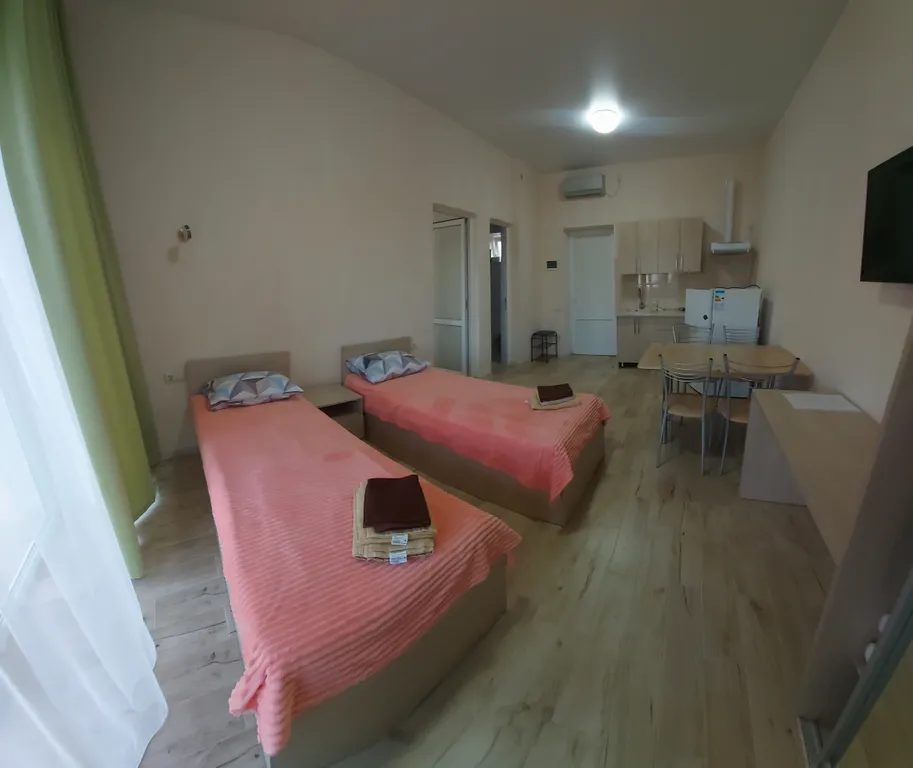 Семейный номер с кухней- гостинной и отдельной спальней