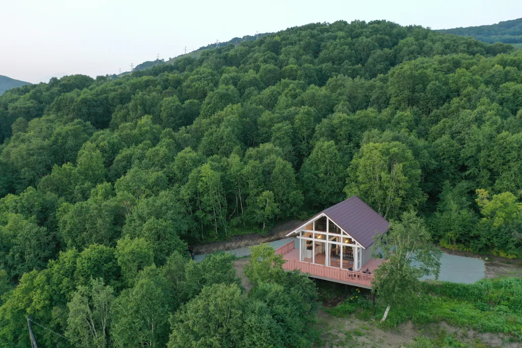 Шале с видом на бухту и вулкан