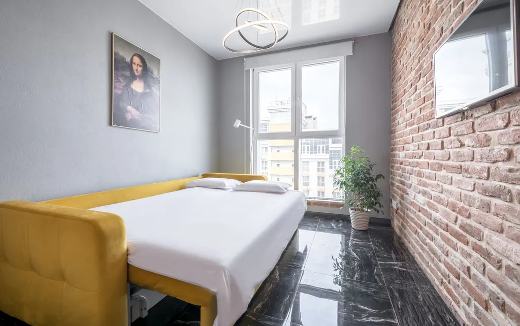 Loft с кроватью-трансформером, кофемашиной и видом на город