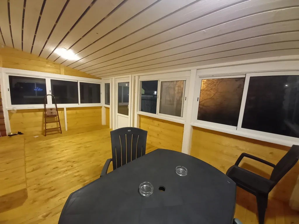 Домик из сосны в городе  С.