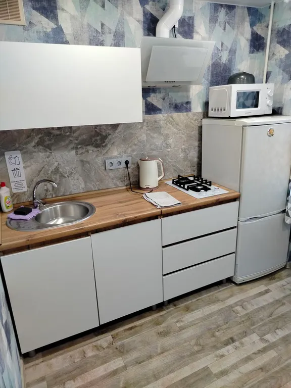 Уютная квартира в самом центре на набережной с видом на парк победы