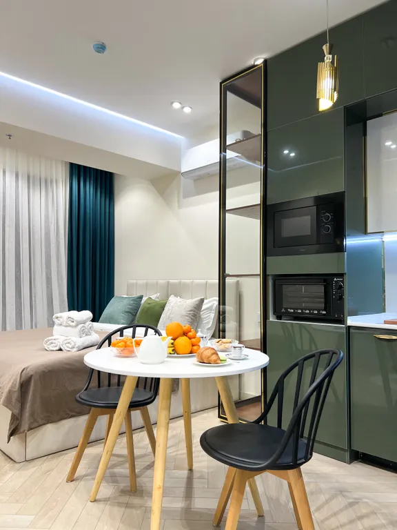 Уютная дизайнерская студия на 16 этаже в ЖК Modera Towers