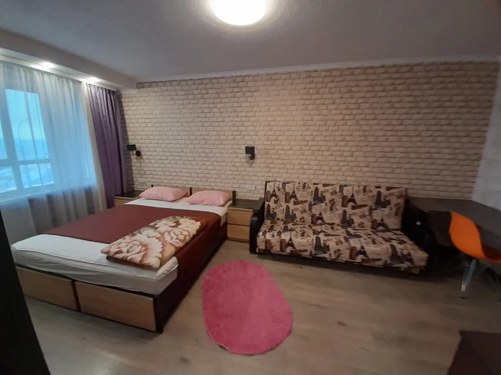 Квартира с балконом и видом на город и залив