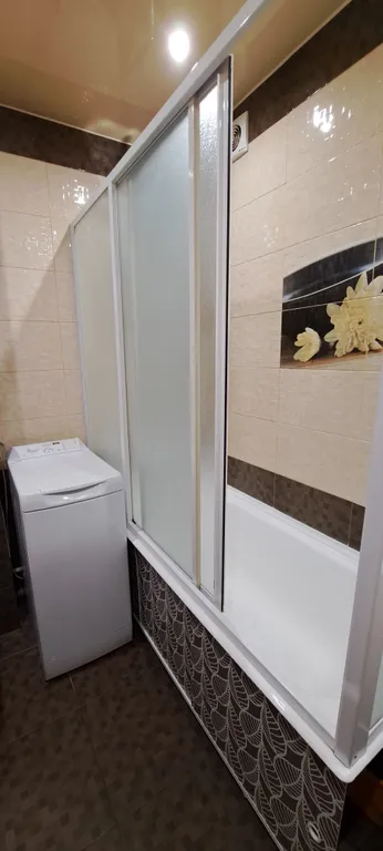 Уютная трехкомнатная квартира с обеденной зоной и двумя спальнями