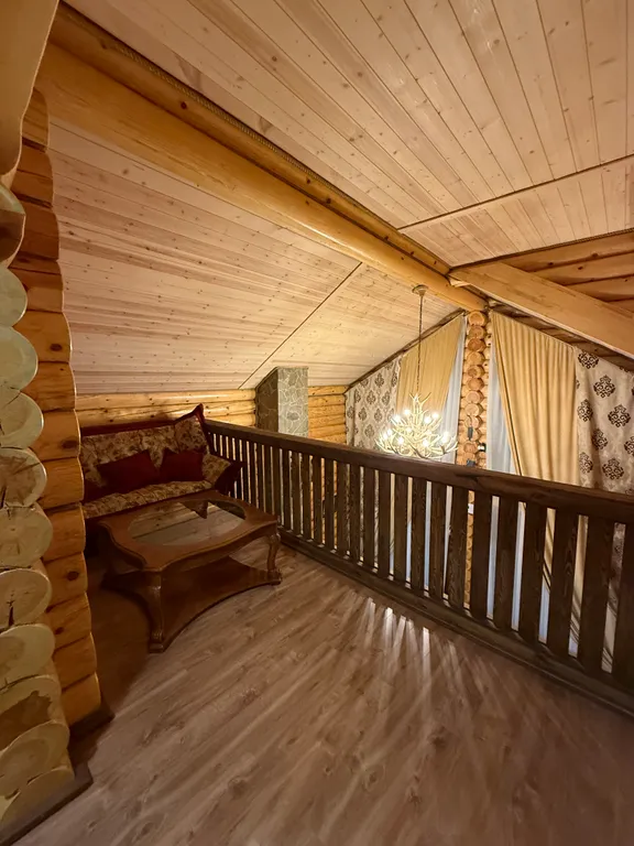 Двухэтажный дом из сруба а Теберде с баней с видом на горы и реку