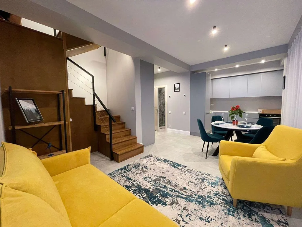 Уютные двухуровневые апартаменты