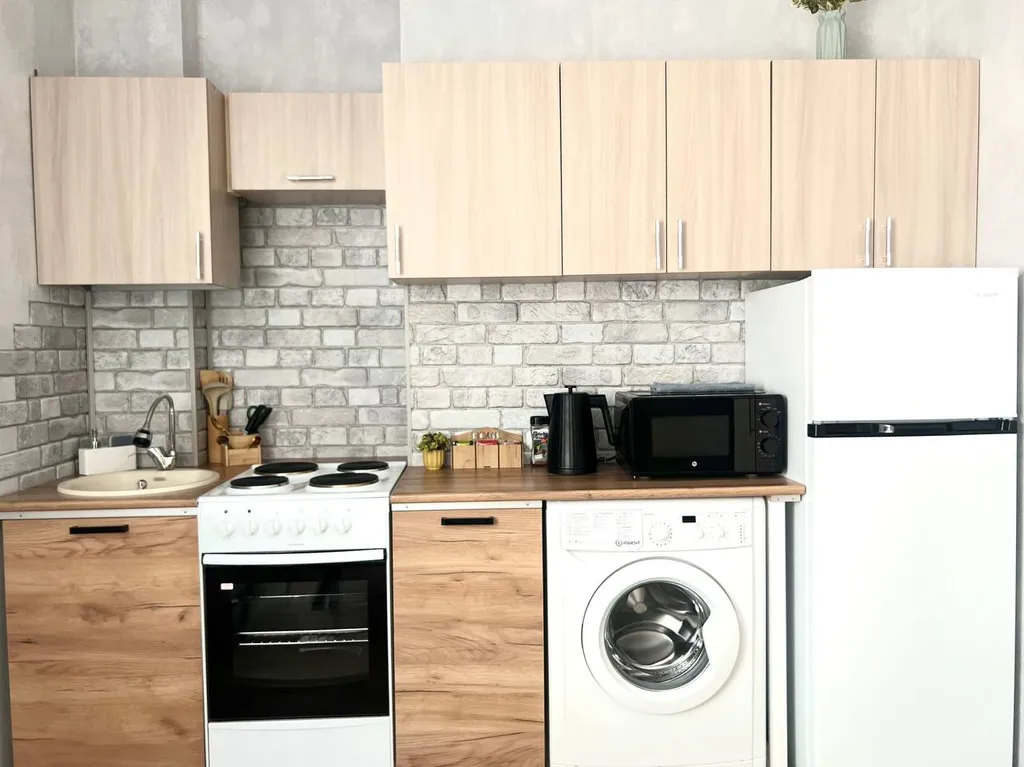 Новый апартамент с зоной отдыха на балконе