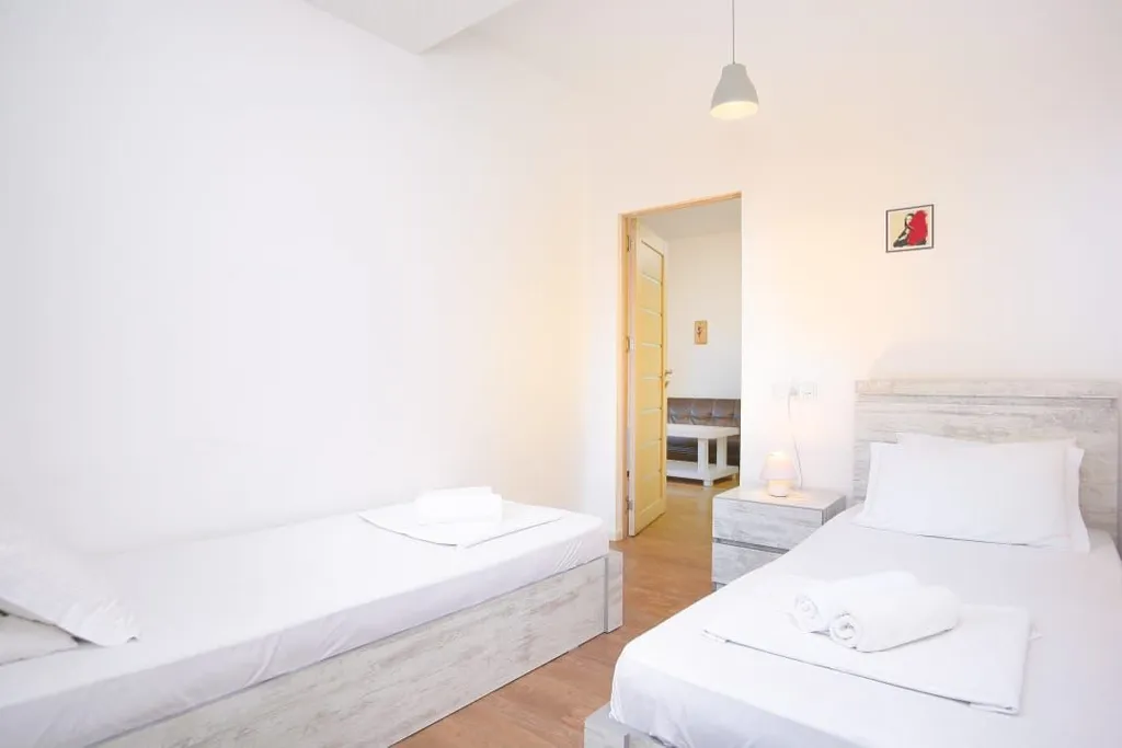 2 спальни в самом центре города, новый дом